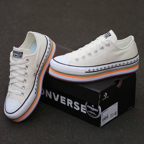 orange and white platform converse