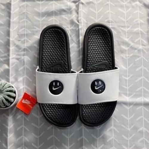 nike benassi smiley face