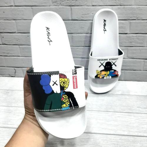 supreme x kaws