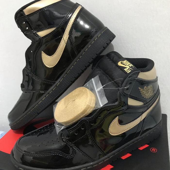 black and gold jordans 9