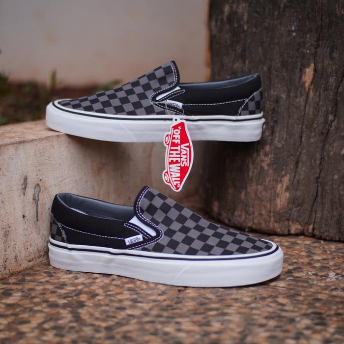 gray and black checkered slip on vans
