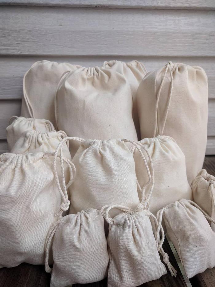 Jual Pouch serut bahan kain blacu serat untuk souvenir menarik