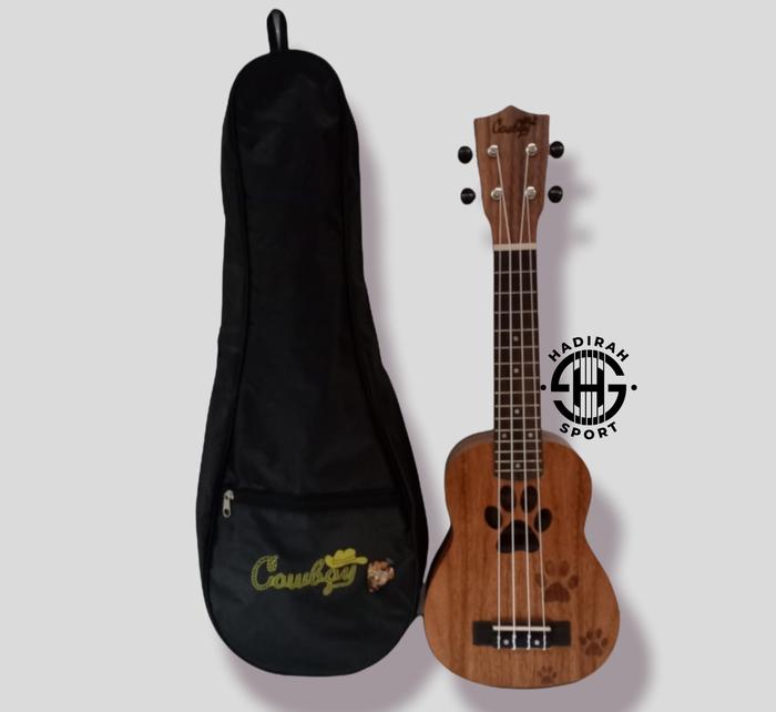 Gambar ukulele cowboy soprano 21 ukulele soprano kualitas premium ORIGINAL - uk21 kaki, ukulele+pick dari hadirah sport undefined Tokopedia
