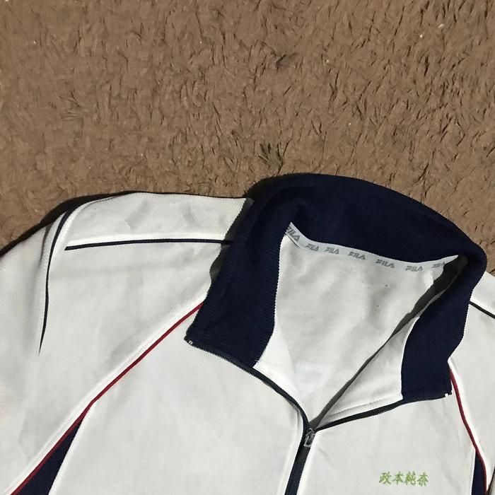 Gambar fila jaket halfzip cakep dari wishyouwell undefined Tokopedia
