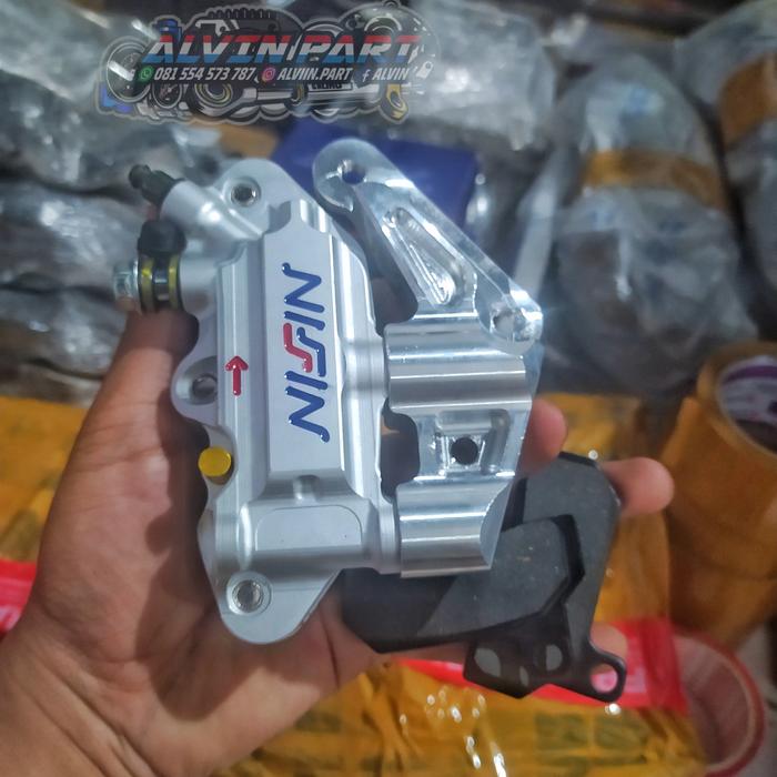 Gambar KALIPER CAKRAM DEPAN NISSIN MONOBLOK 4P BREKET PANGKON SKOK NINJA dari Alvin part undefined Tokopedia