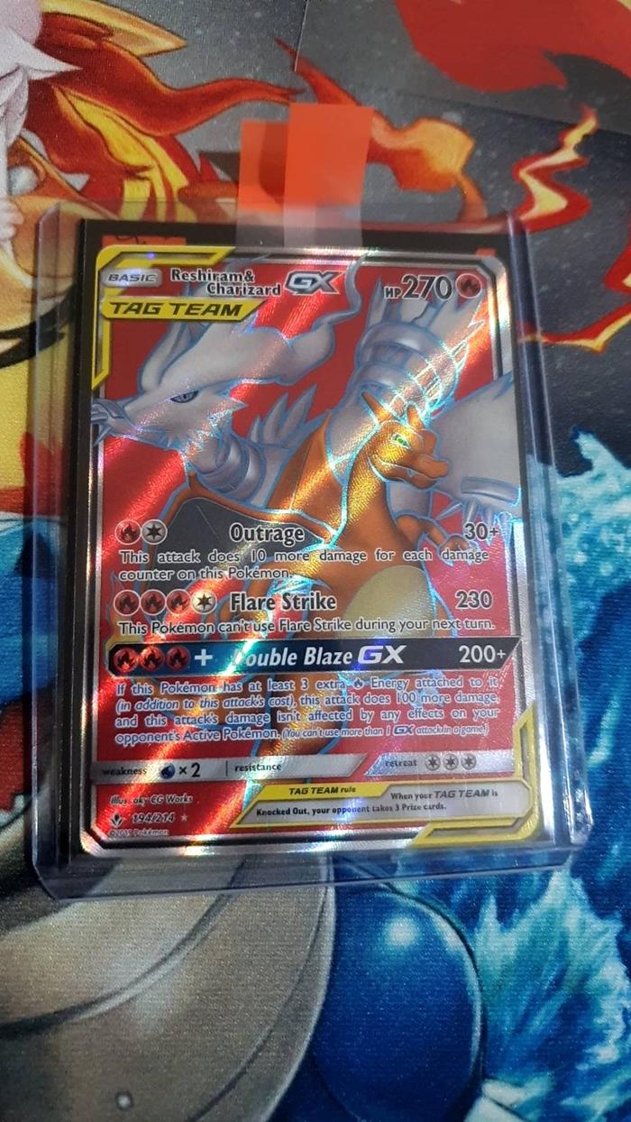 Gambar Reshiram & Charizard GX - 194/214 - Full Art Ultra Rare Sun & Moon: dari bert pokemart undefined Tokopedia