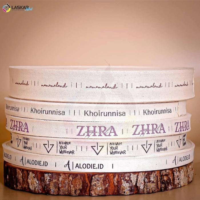 Gambar label baju custom bahan piterban 1,5cm panjang pita 65m - tinta 1warna dari agpstore13 undefined 3 Tokopedia