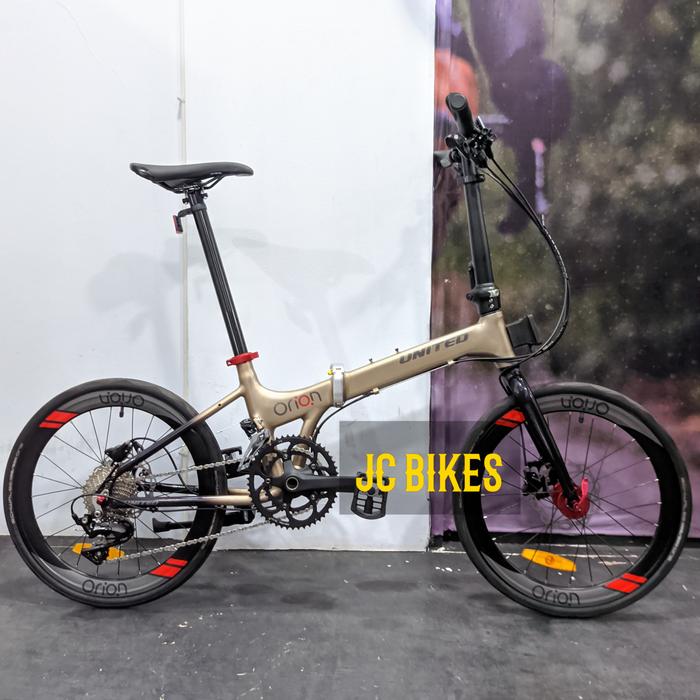 Gambar Sepeda Lipat 20+ United Orion Vol 2 Shimano 105 2x11 Hidrolik Jangkrik - Bronze Black dari JC Bikes undefined Tokopedia