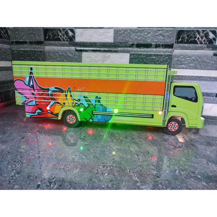 Gambar miniatur truk sulawesi style variasi lampu led - MOTIF 2 dari Miniatur Truk Store undefined Tokopedia