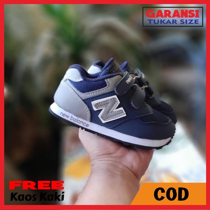 Jual Sepatu anak laki dan perempuan motif N perekat Navy usia 2-8