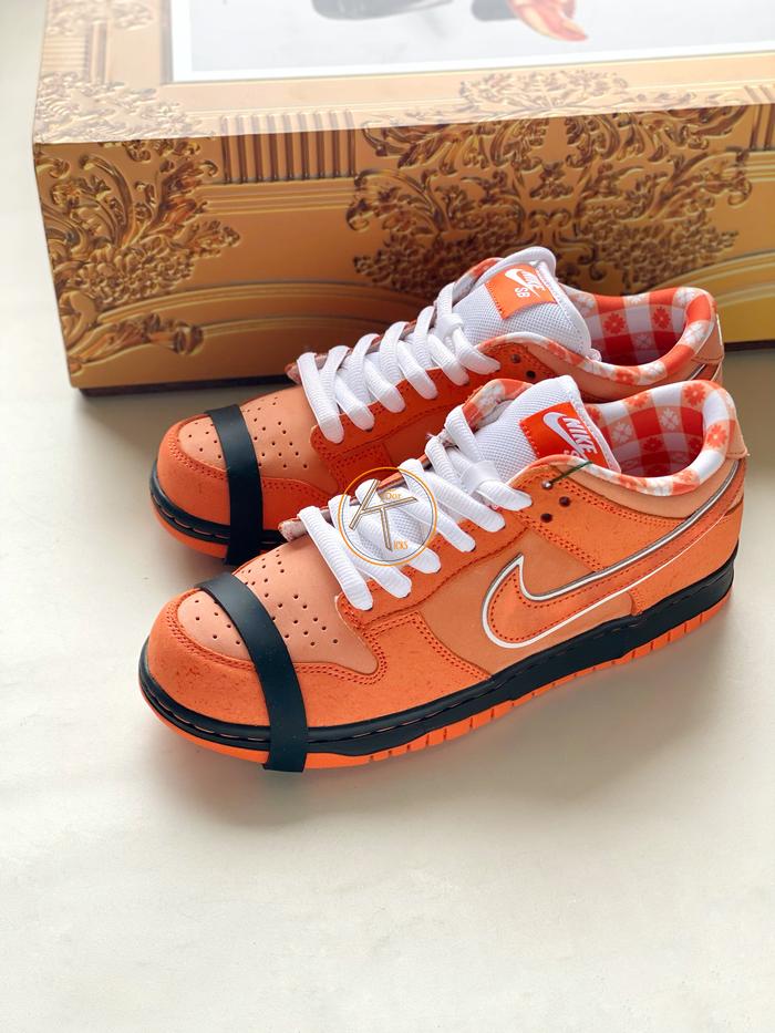 concepts orange lobster bearbrick