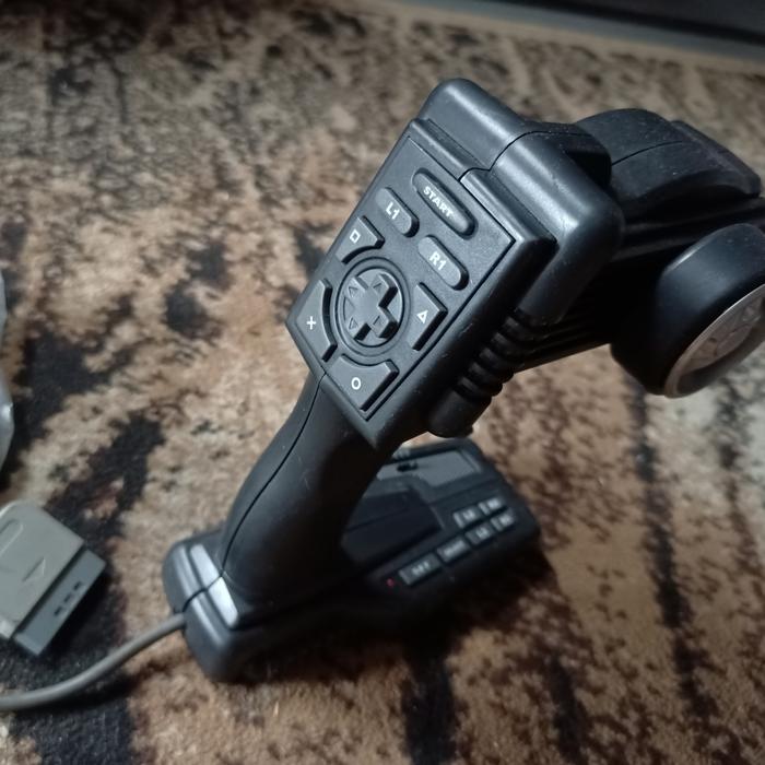 Gambar Hand held steering wheel Controller PS1 RARE - Loose dari Catalexia undefined Tokopedia
