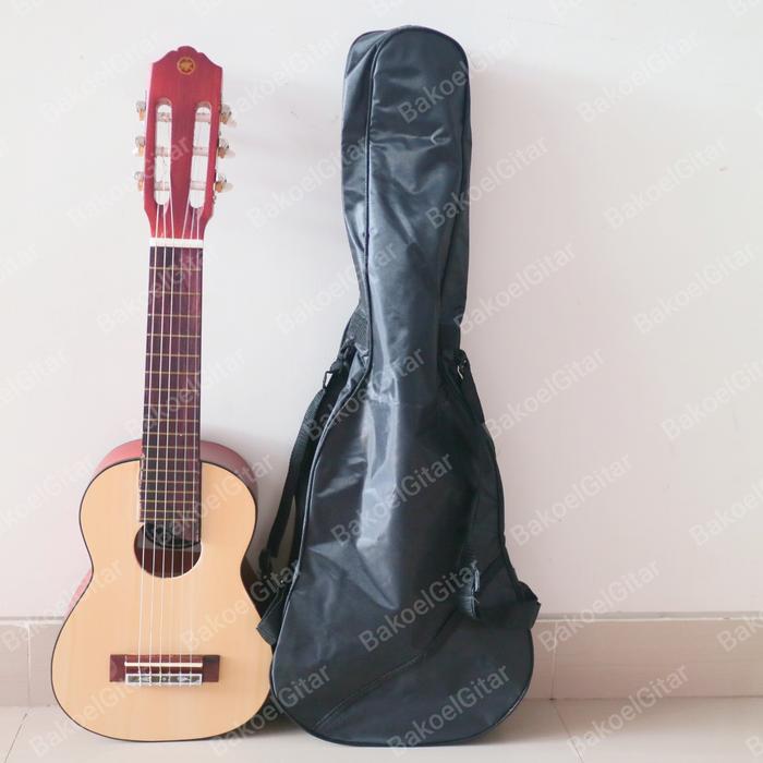 Gambar Gitarlele/gitar lele/gitar mini/gitar kecil/gitar doremi - Cokelat dari BakoelGitar undefined Tokopedia