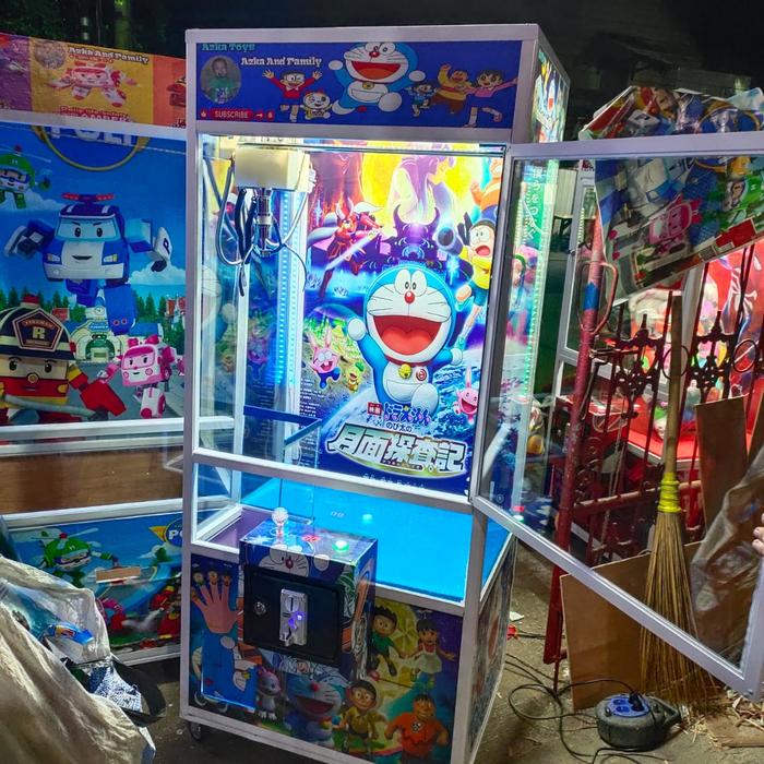 Gambar MESIN CAPIT BONEKA (CAPITAN BONEKA) - DORAEMON, +KOIN & BONEKA dari 09fashion undefined Tokopedia