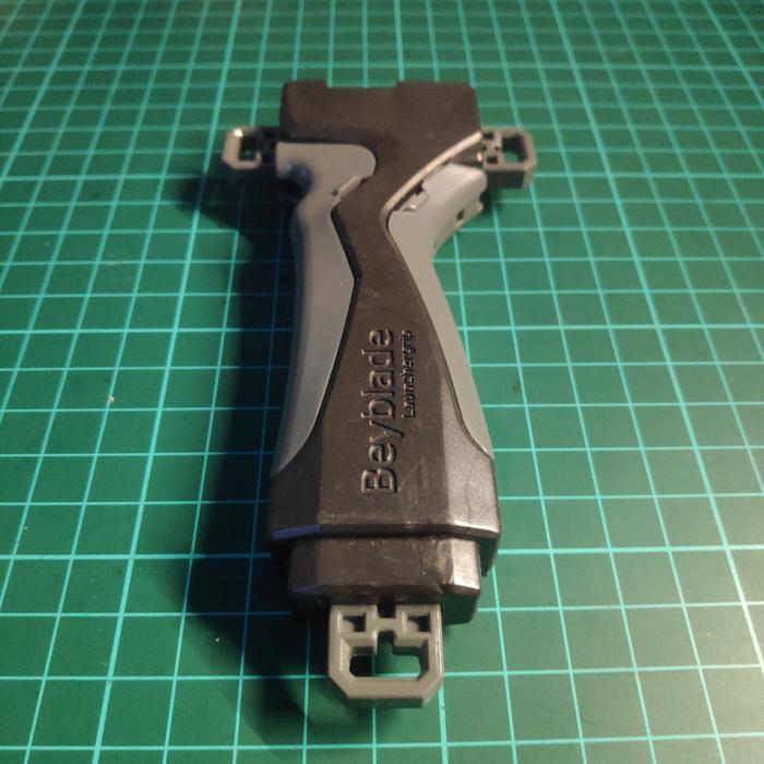 Gambar Beyblade Launcher Grip Takara Tomy - Gun Metal Black dari Tactic Shop undefined Tokopedia