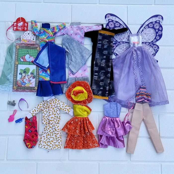 Gambar set baju isi 10 boneka berbi 30cm - muslim dari butik barbie fashion shop undefined Tokopedia