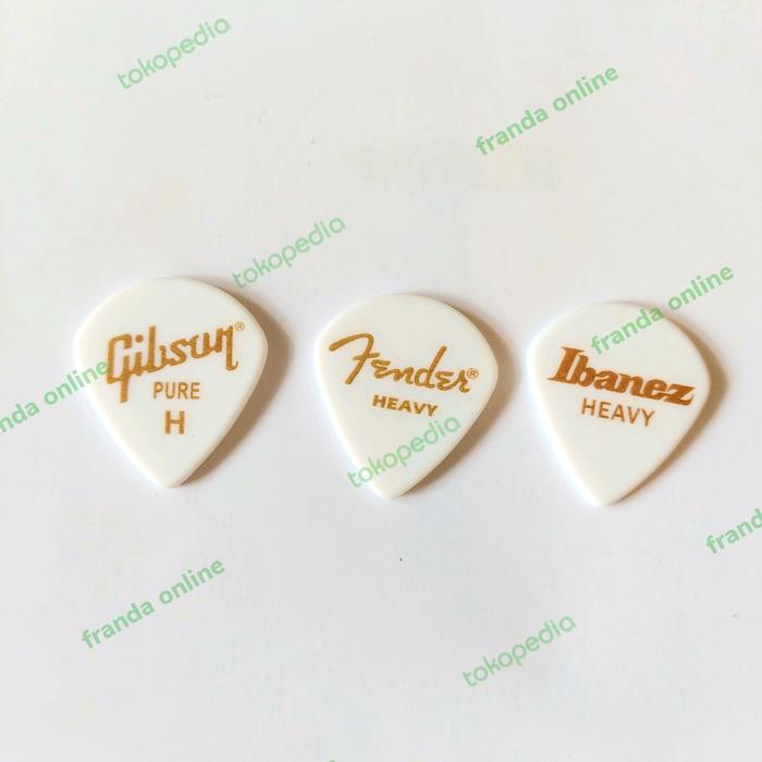 Gambar Pick Gitar Fender Ibanez Gibson warna putih tebal 2.0 mm (2cm x 2.5cm) dari Franda Online undefined Tokopedia