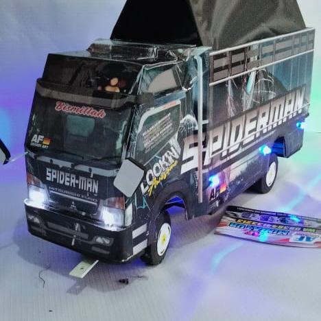 Gambar Truk oleng jumbo miniatur truk oleng kayu triplek besar lampu terpal - Spiderman hitam dari Tulus.id championship undefined Tokopedia