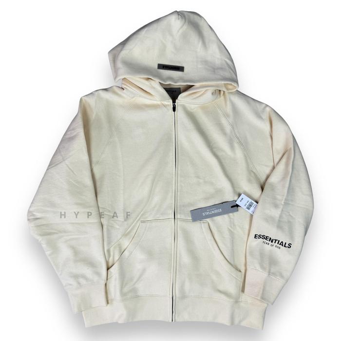 Gambar FOG Fear of God Essentials Full Zip Up Hoodie Applique Logo - Cream, S dari HYPEAFID undefined Tokopedia