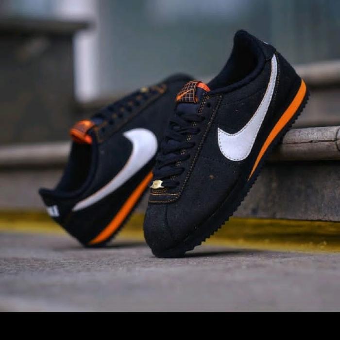 nike cortez black orange