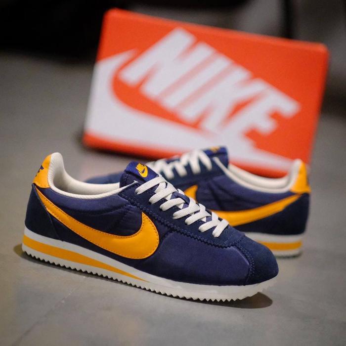 nike cortez orange and blue
