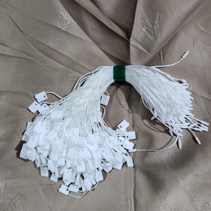 Gambar TALI HANGTAG BUAT PASANG MERK/LABEL DLL HARGA PER PACK ISI 200PCS - Putih dari Mulia Jaya Interlining undefined Tokopedia