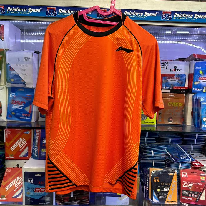Gambar KAOS BADMINTON LINING TIMBUL ORIGINAL - M ORANGE dari SPORT CENTRAL undefined Tokopedia