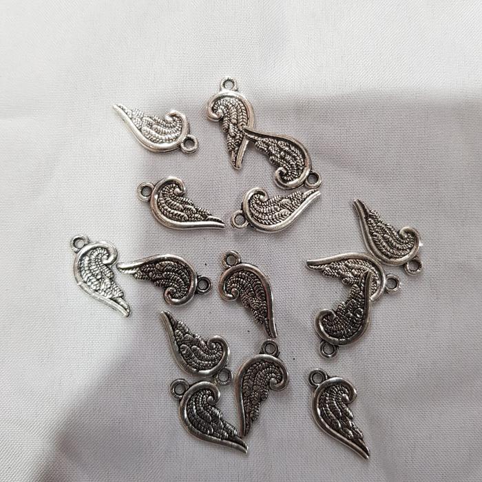 Gambar CHARM SAYAP SETENGAH HATI /ACC MANIK MANIK - NECKEL dari Toko Satria Setiabudi Bali undefined 3 Tokopedia