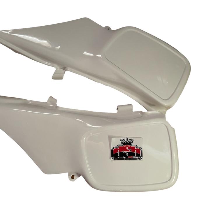 Gambar SIDE PANEL TS SIDE COVER PINGGIR SUZUKI TS MERK XCORSSBONE - Putih dari dsb mxshop undefined Tokopedia