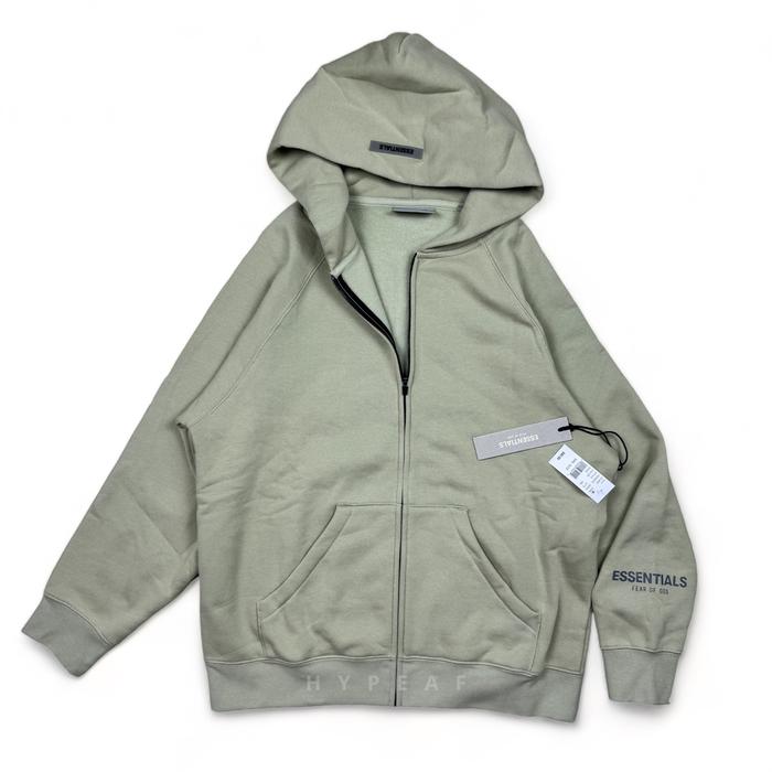 Gambar FOG Fear of God Essentials Full Zip Up Hoodie Applique Logo - Sage, S dari HYPEAFID undefined Tokopedia