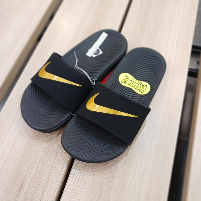 nike sandals black and gold