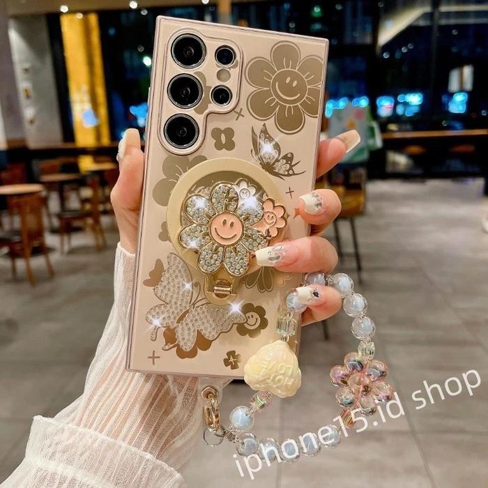 Gambar Luxury sparkling diamond flower smiling face magnetic wireless charging bracelet phone case for Samsung Galaxy S24 S23 S22 Ultra Plus zfold 4/5/6 zflip 3/4/5/6 fashionable rotating folding stand wrist anti drop hanging rope anti drop protective casing - 1, s22 dari bLancacom undefined Tokopedia