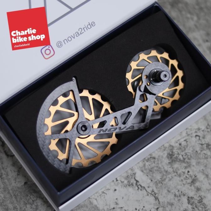 Gambar PULLEY NOVA RIDE 2ND GEN OSPW SHIMANO R8000-R9150 CERAMIC 14-17T - Gold dari BAR CAR undefined Tokopedia