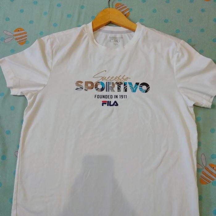 Gambar kaos Fila white line heritage original preloved dari maulanaagus undefined Tokopedia