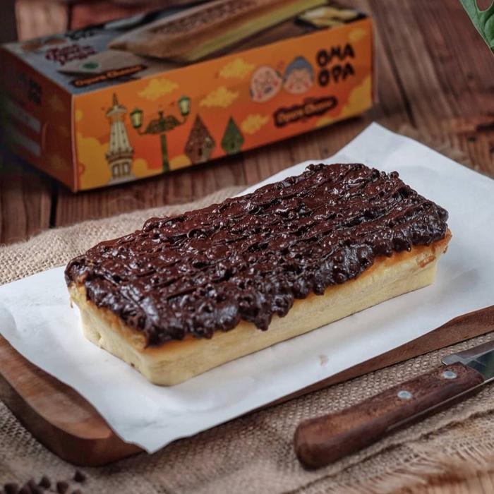 Gambar Oma Opa OGURA - Bolu Keju/Cokelat Toping -Besar (MAX 3HARI SUHU RUANG) - Bolu CheeseKeju, Cokelat Crunchy dari Jastip With Happy undefined Tokopedia