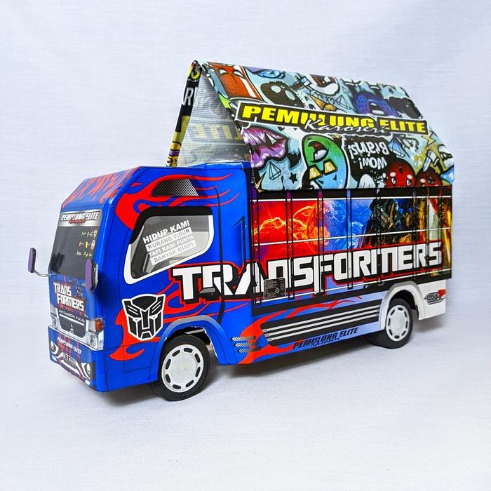 Gambar Mainan Miniatur Mobil Truk Trek Truck Oleng Stiker Motif Keren Lampu - Transformers, Lampu+Terpal dari PLANET'S STORE undefined Tokopedia