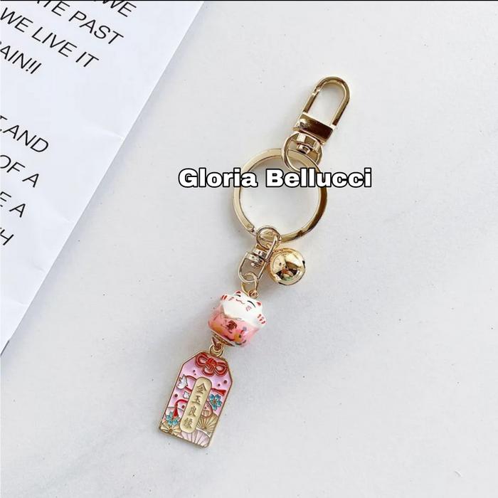 Gambar gantungan kunci jepang maneki neko souvenir japan lucky cat hoki - a dari Gloria Bellucci. undefined 5 Tokopedia