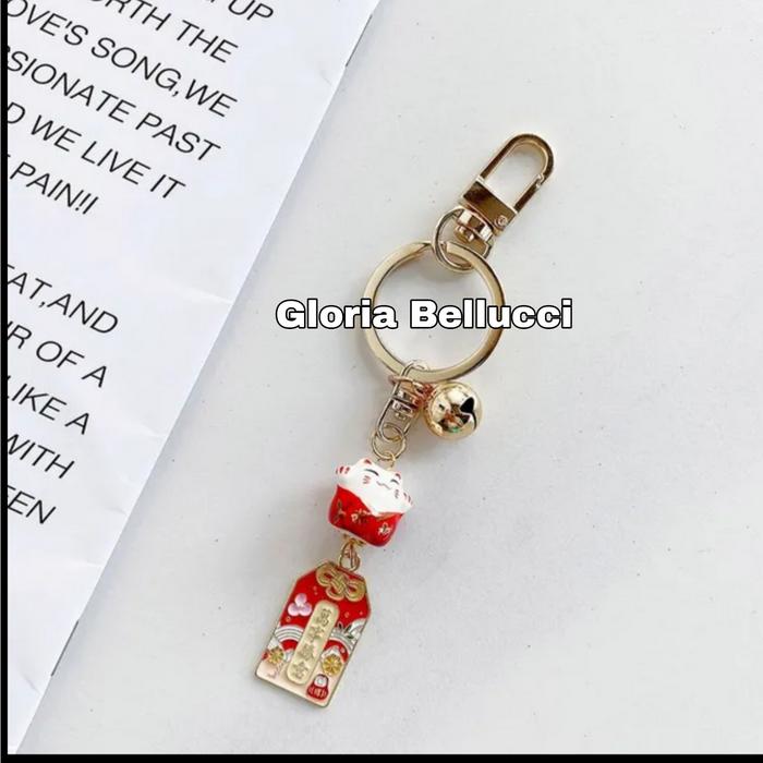 Gambar gantungan kunci jepang maneki neko souvenir japan lucky cat hoki - a dari Gloria Bellucci. undefined Tokopedia