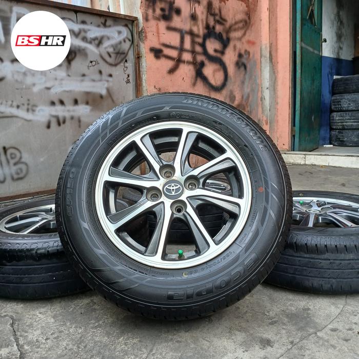 Gambar velg seken copotan TOYOTA CALYA R14 bonus ban 185/70 r14 dari Bshr Velg Ban Mobil undefined Tokopedia