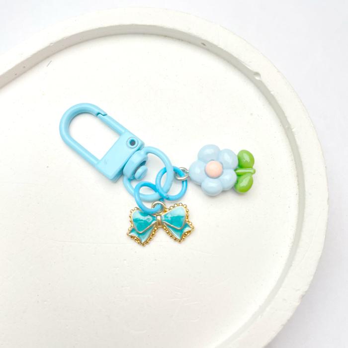 Gambar Gantungan Kunci Karakter Timbul Mini Ribbon Coquette Glitter Hologram Aesthetic Ganci Pita Lucu Aksesoris Keychain Cute Korea Keyring Anak Hiasan Tas DaisyHelloo - GT 63 - BIRU MUDA dari outfit kreatif undefined Tokopedia