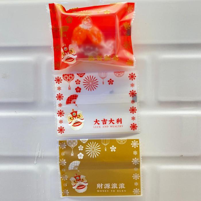 Gambar 100LEMBAR PLASTIK SEALER 7X10CM 7X9.5CM / PLASTIK NASTAR IMLEK / PLASTIK KUE KERING / HAMPERS CHINESE NEWYEAR / PARCEL IMLEK - IM 7X9.5cm BM dari tbkmeta undefined Tokopedia