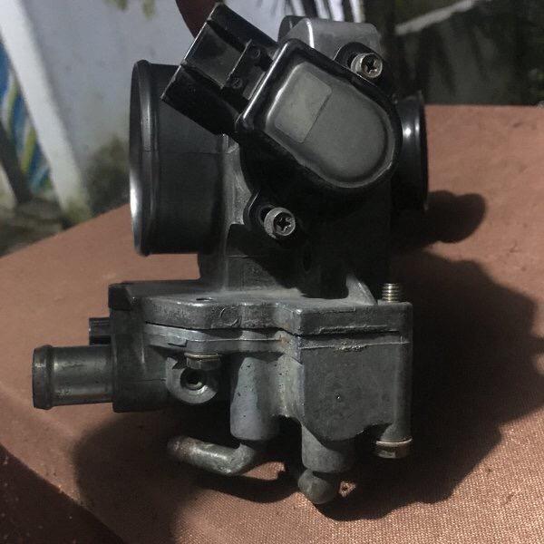 Gambar Throttle Body Mazda Lantis dari d_garage17 undefined Tokopedia