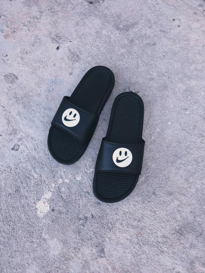 smiley face nike slides