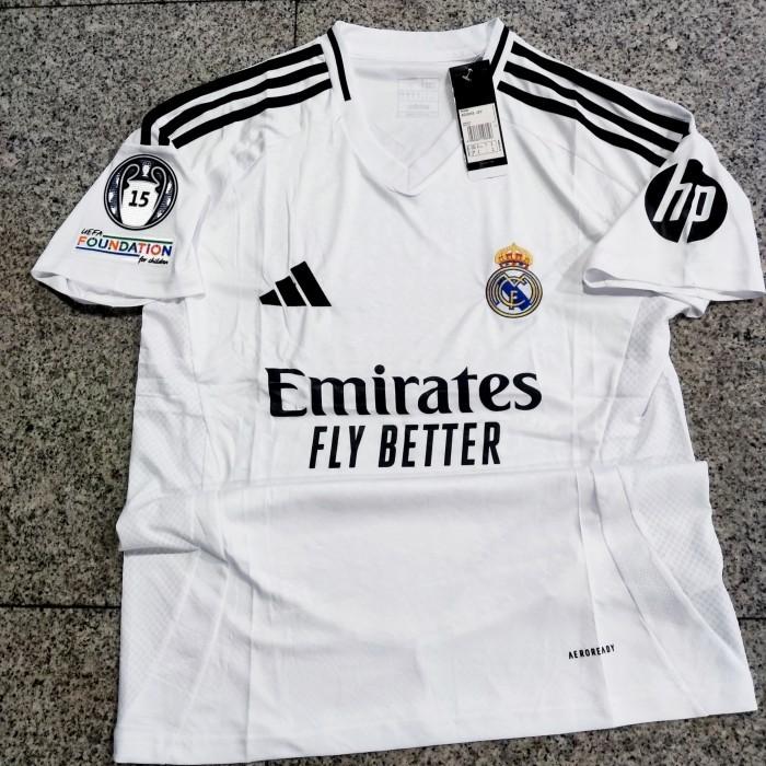 Gambar JERSEY BAJU BOLA MADRID HOME 2024/2025 FULLPATCH UCL - XL dari Halili Merch undefined Tokopedia
