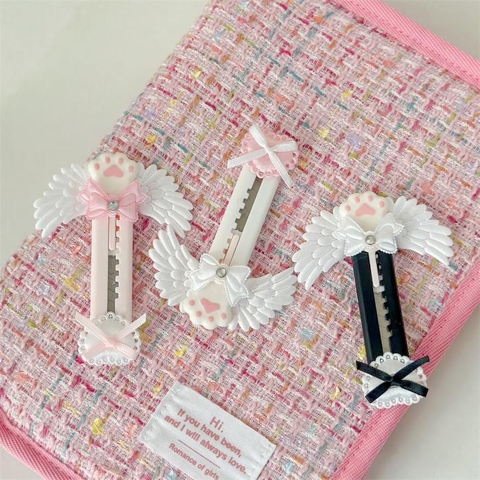 Gambar Cute Cat Paw Utility Knife Lovely Wing Bowknot Style Open Box Cutter Letter Envelope Opener Mail Knife School Office Supplies dari raurstoree undefined Tokopedia