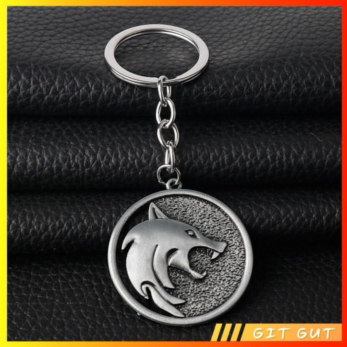 Gambar Keychain Gantungan Kunci The Witcher School of The Wolf Logo - Model 1 dari Git Gut undefined Tokopedia