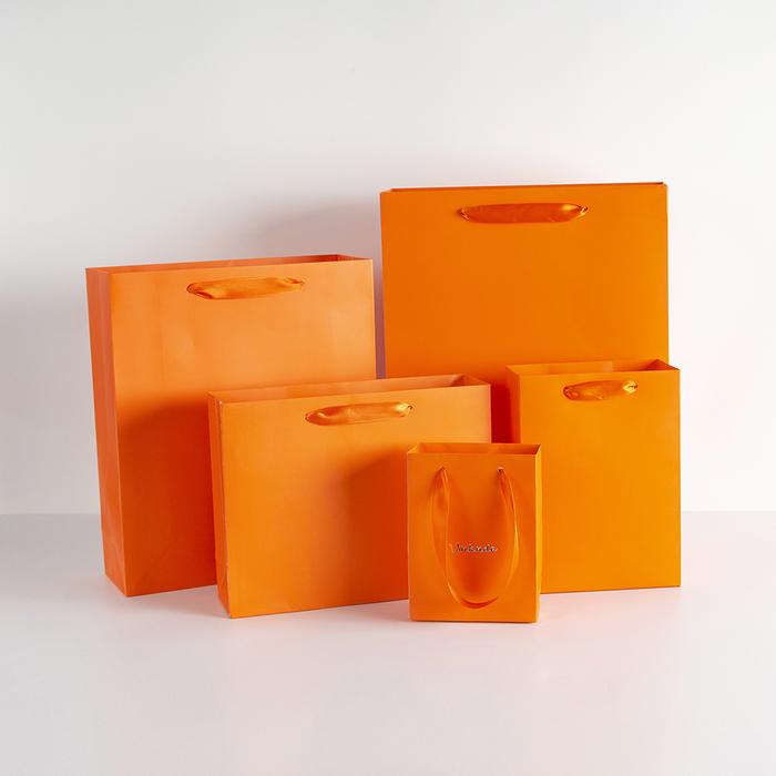 Jual 100pcs customized orange kraft paper shopping bag printing