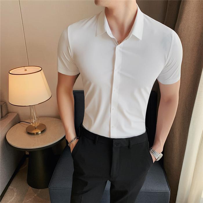 Gambar kemeja pria putih polos lengan pendek slimfit elastic shirt dewasa - Putih, M dari Zafos.id undefined Tokopedia