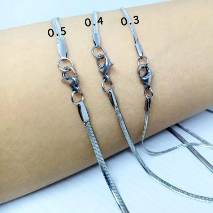 Gambar Kalung titanium pria wanita model belut gepeng/pipih terlaris asli titanium Stainless - 0.3mm/silver, 45cm dari Metal Titanium undefined Tokopedia
