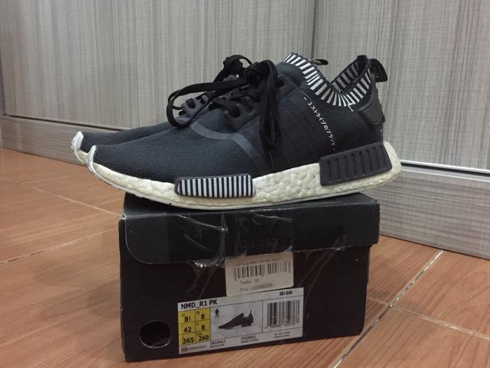 Nmd black japan pk best sale